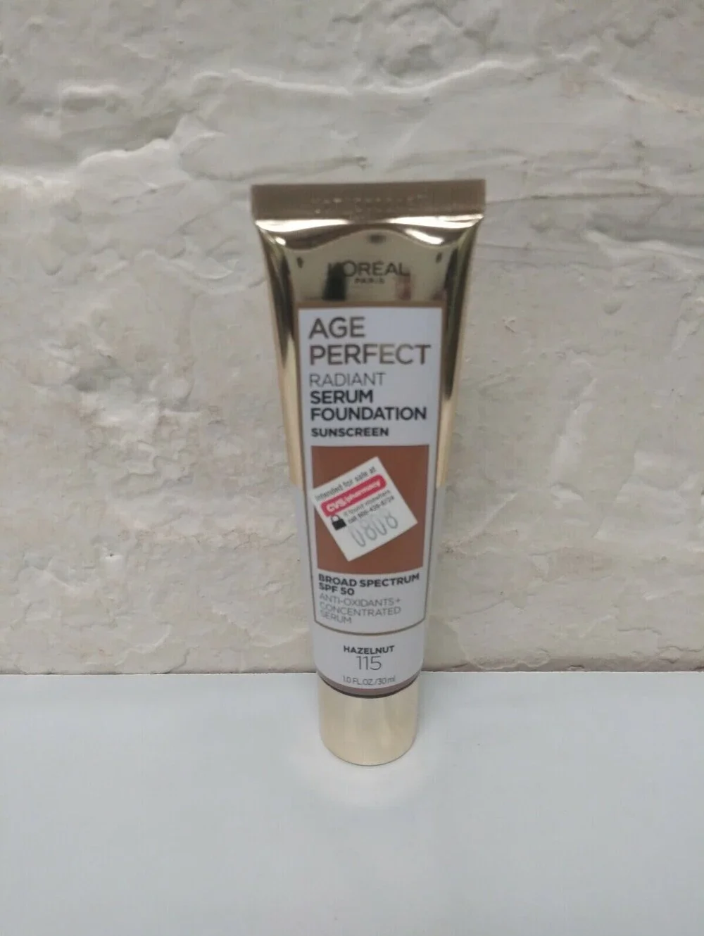 L'Oreal Paris Age Perfect Radiant Serum Foundation with SPF 50 Hazelnut 115 1 oz
